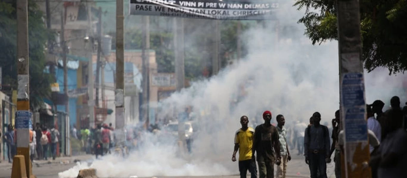 Αϊτή: Συγκρούσεις μεταξύ πολιτών και αστυνομίας σε διαδήλωση κατά του προέδρου της χώρας (βίντεο)